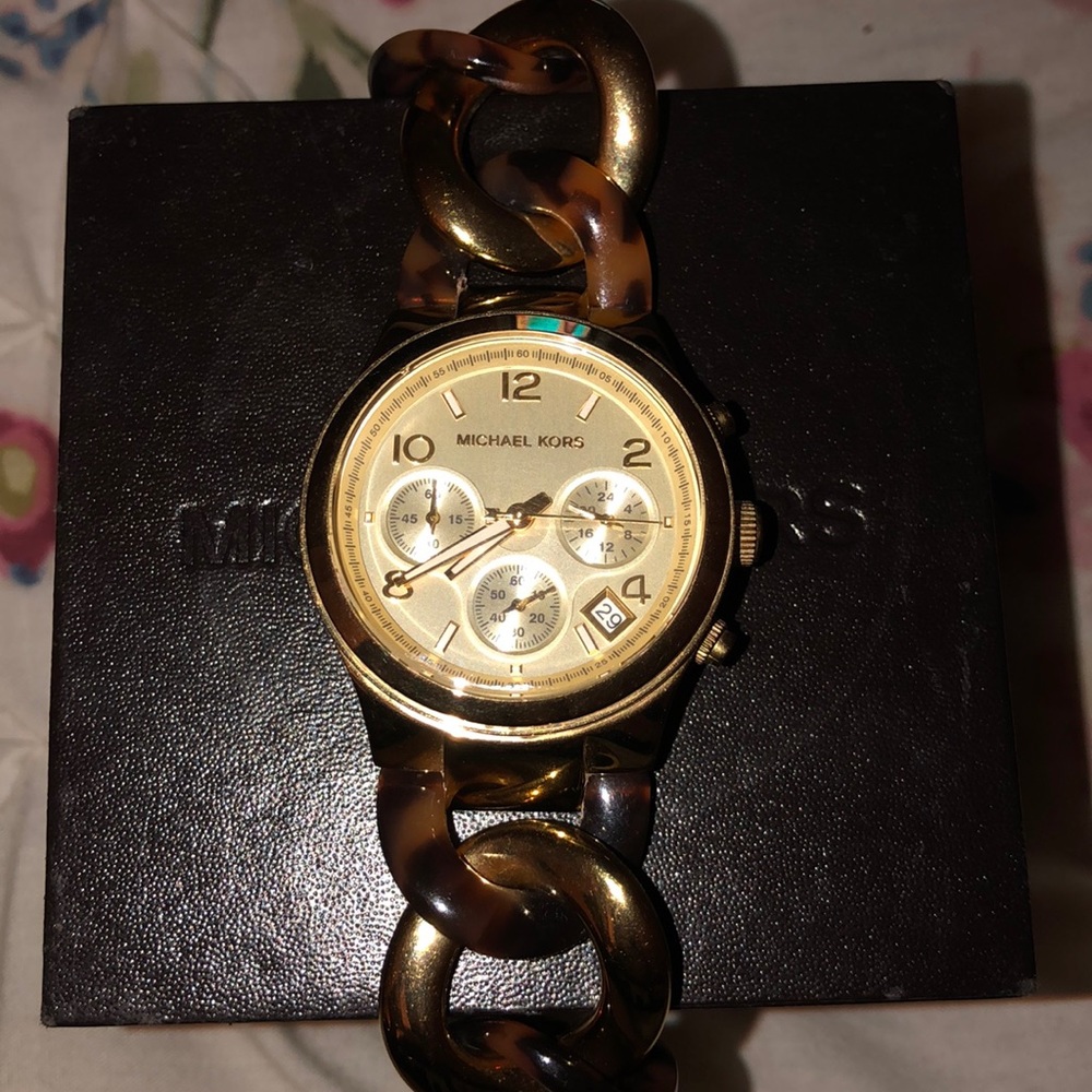 Micheal Kors gold and leopard watch